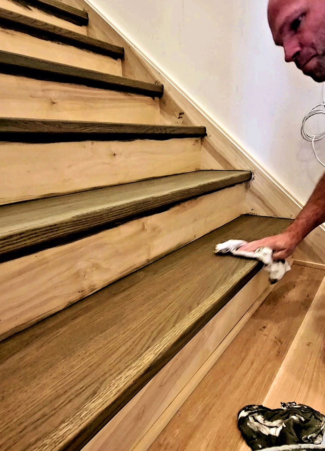 Boss Painting crew meticulously preparing exterior surfaces for durable finish